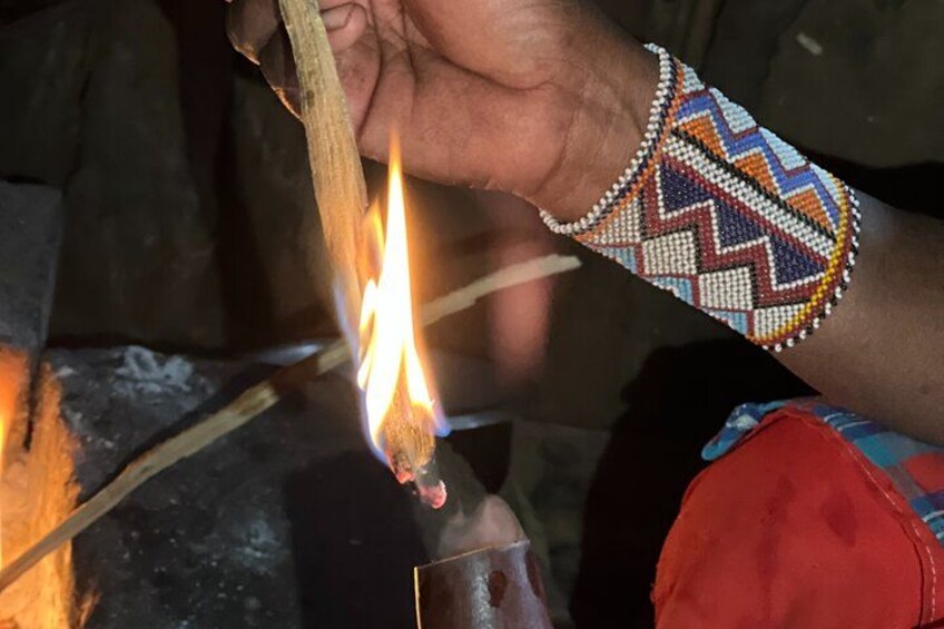 A person lighting a matchstick. 2