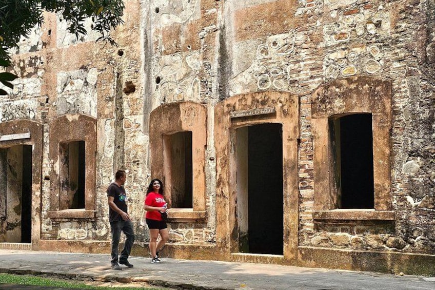 A historical building with arched windows and stone walls. 4
