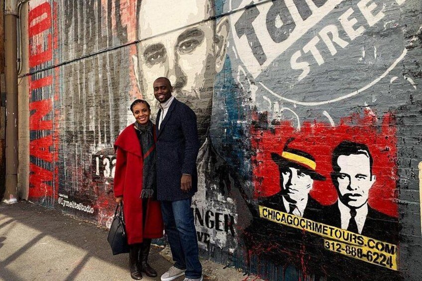 Lady in Red Posing at the Dillinger Mural 3