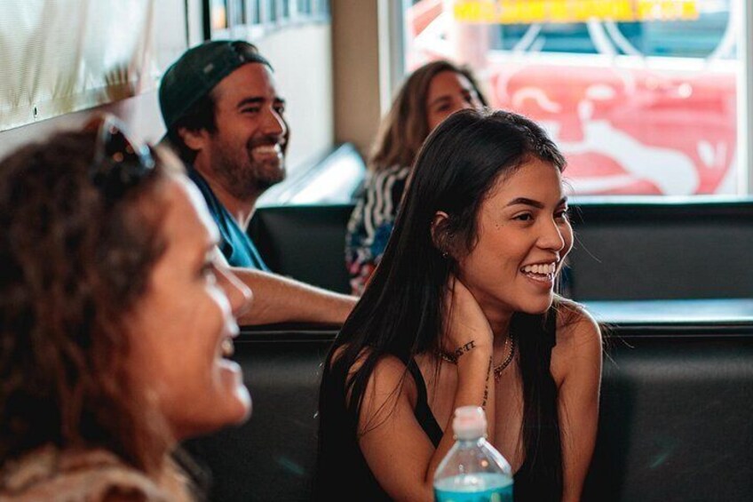 Guests laugh and bond over Chicago’s best bites and stories on our Chicago Food Tours! It’s all smiles, new friends, and unforgettable moments on one of the most fun Food Tours in Chicago! 4