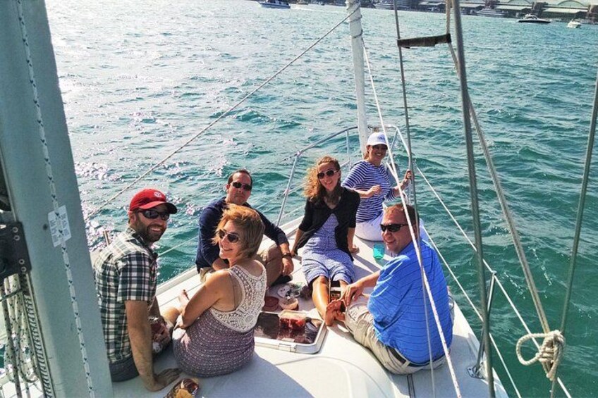 Relaxing on the bow with friends. 4