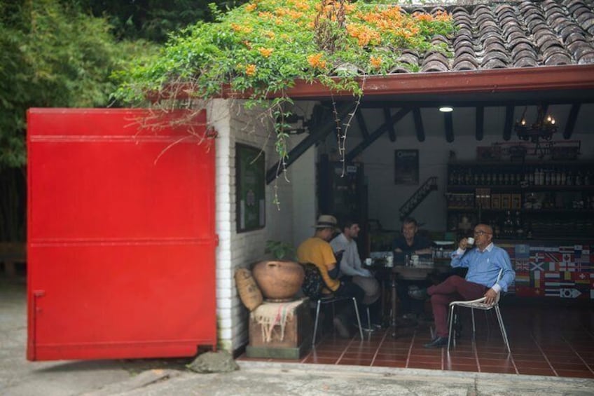 Travelers sample the latest house roasts at the Hacienda Coloma Coffee plantation.