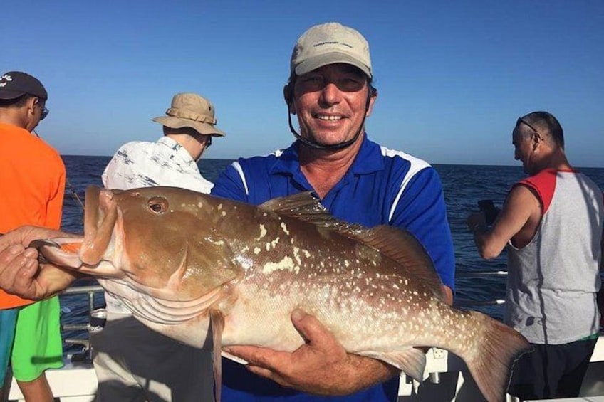 Captain Paul with large red Grouper 1