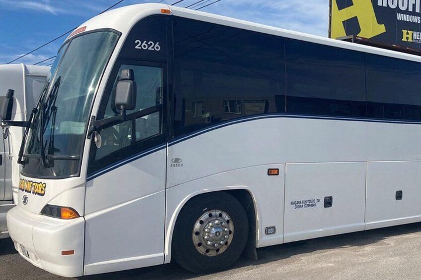 Tour onboard one of our multi-passenger buses or touring vans 3