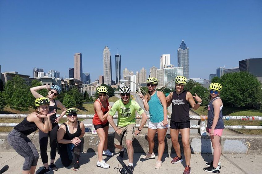 Striking a pose on the Jackson Street Bridge for iconic skyline view in the background. 2