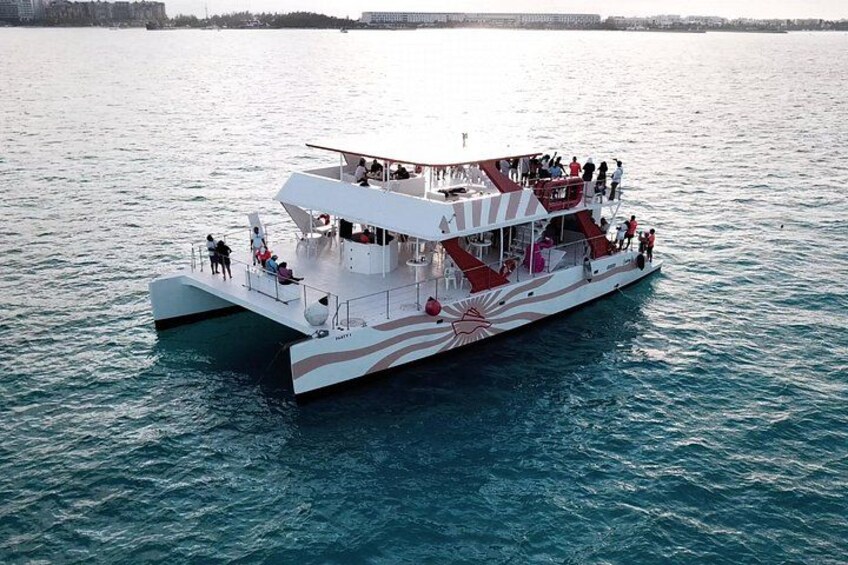 Happy guest enjoying view of Cancun's turquoise waters 2