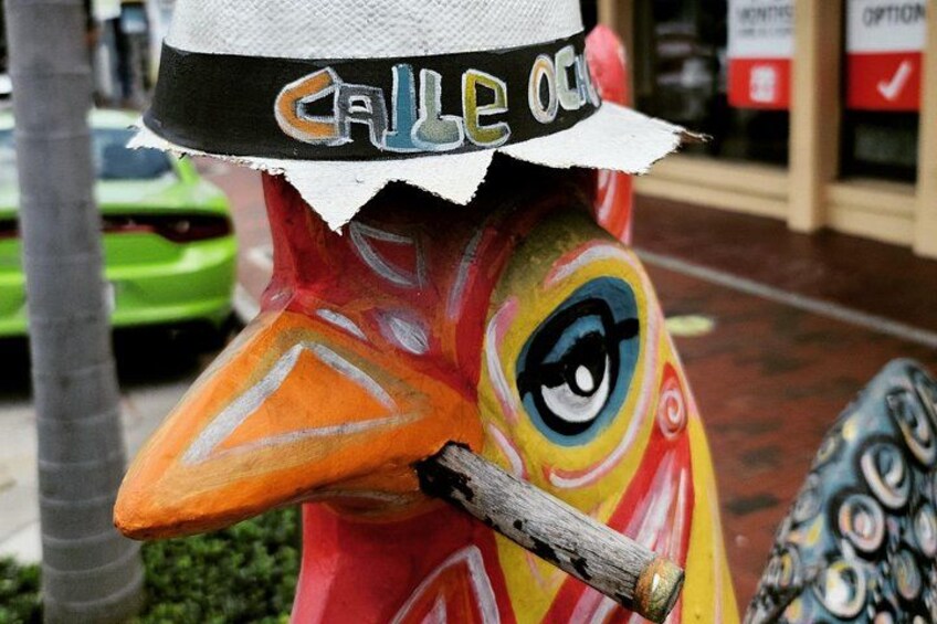 We will teach you about the cultural significance of the roosters in the Cuban community. 5