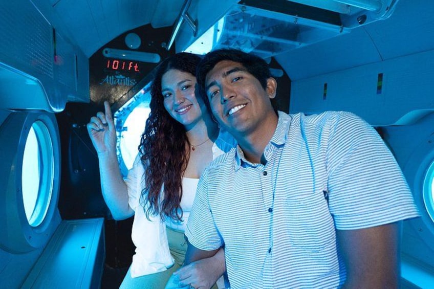 A space shuttle interior with a sign reading '101st Atlantis.' 2