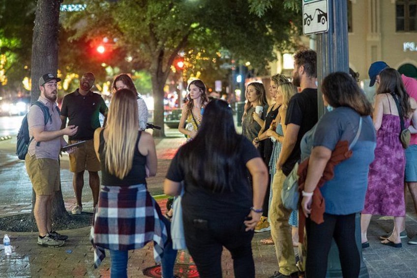 Our guide reveals the details of a possible suspect outside the historic Speakeasy Tavern 2