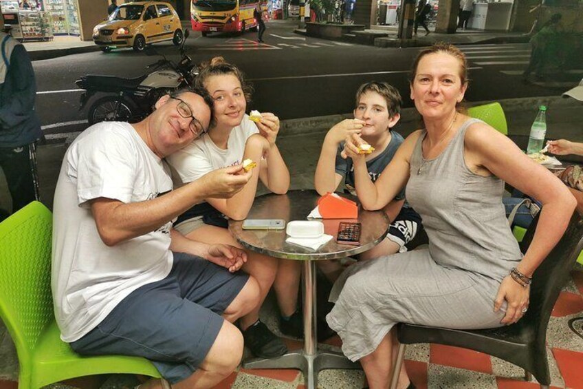 Eating Arepa de chocolo 5