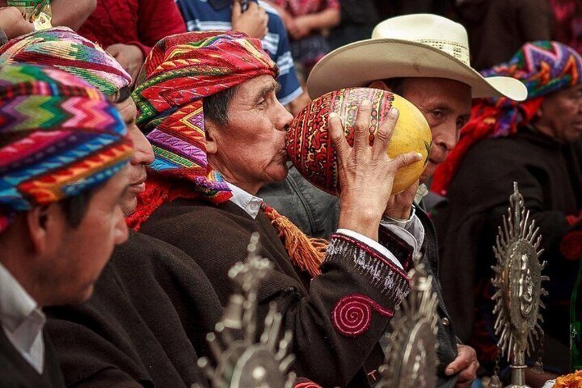 People wearing colorful traditional attire and sombreros. 1