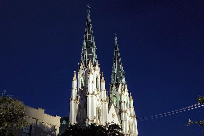 A church with two spires and a clock tower. 5