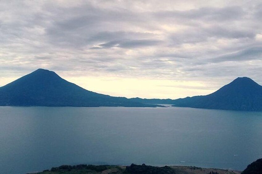 A lake with mountains in the background. 2