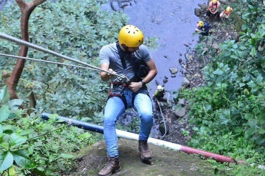 Enjoy the rappel, down by rope! 4