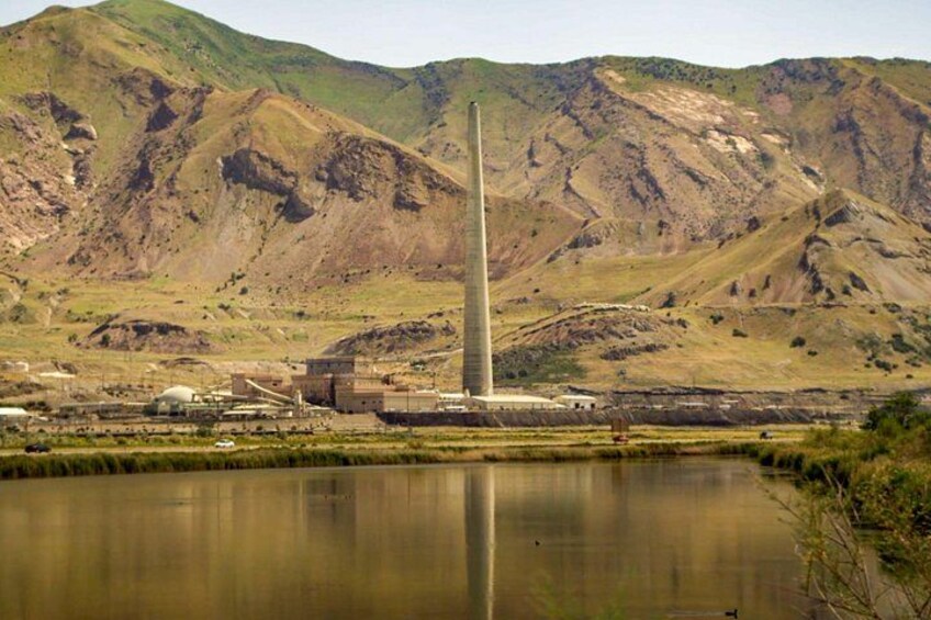 Rocky Mountains behind the copper mine smelter, it's the tallest structure west of Mississippi River, same height as Empire State Building in NYC 2