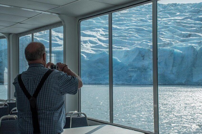 Guest getting up close to the Portage Glacier while staying warm 2