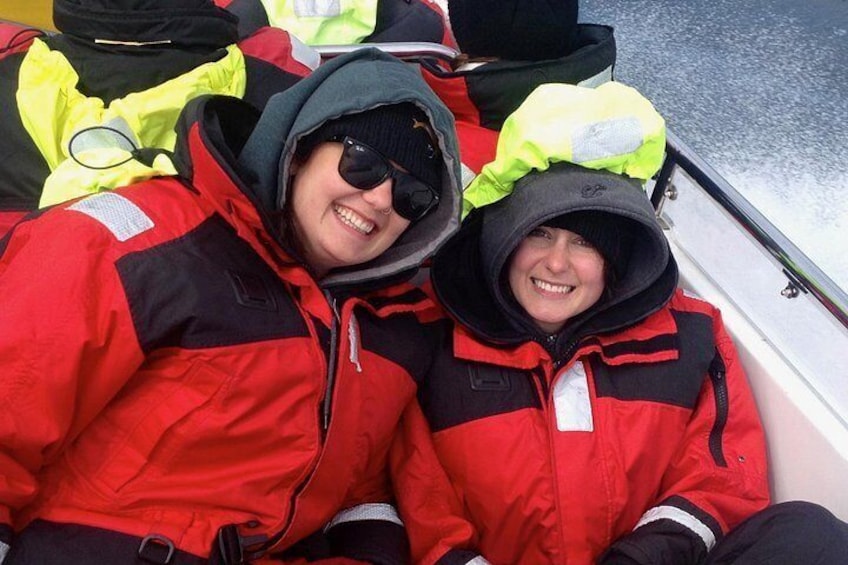 Open boats come equipped with many extras including 2 piece suits for added comfort. They are not needed on our semi-covered catamarans 2