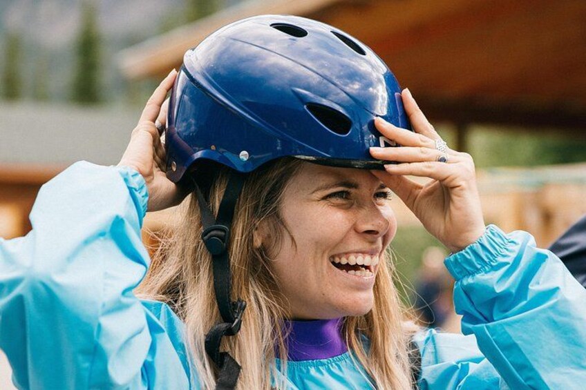 A person wearing a blue helmet and a blue jacket. 5