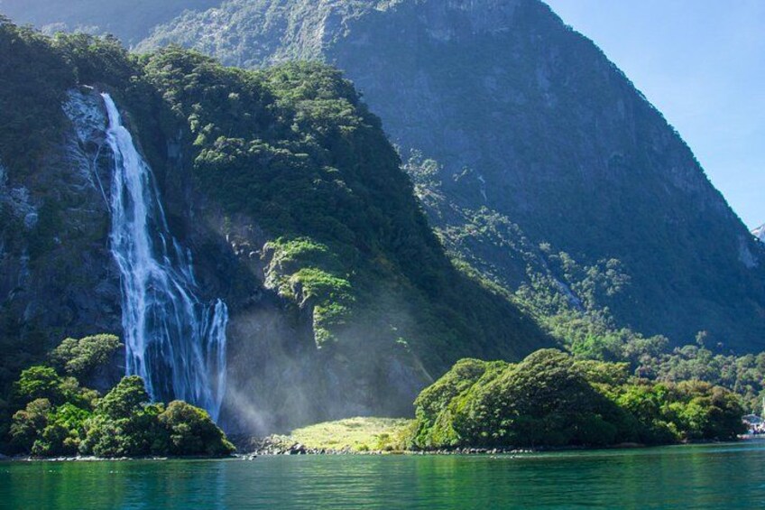 Waterfall at Milford Sound - one of many you will see on this flight & cruise 1