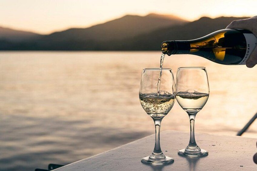 Pouring Marlborough Sauvignon Blanc at sunset 2