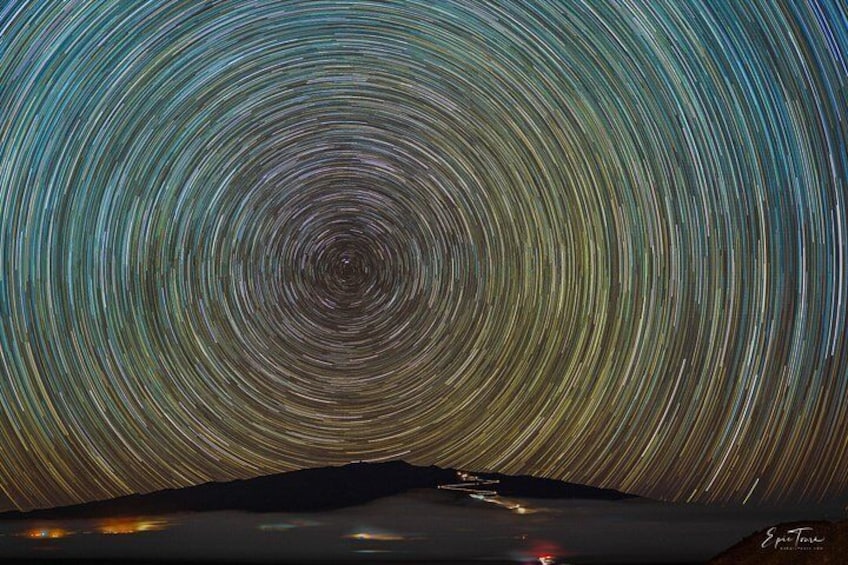 A star trail photograph with concentric circles of stars. 5