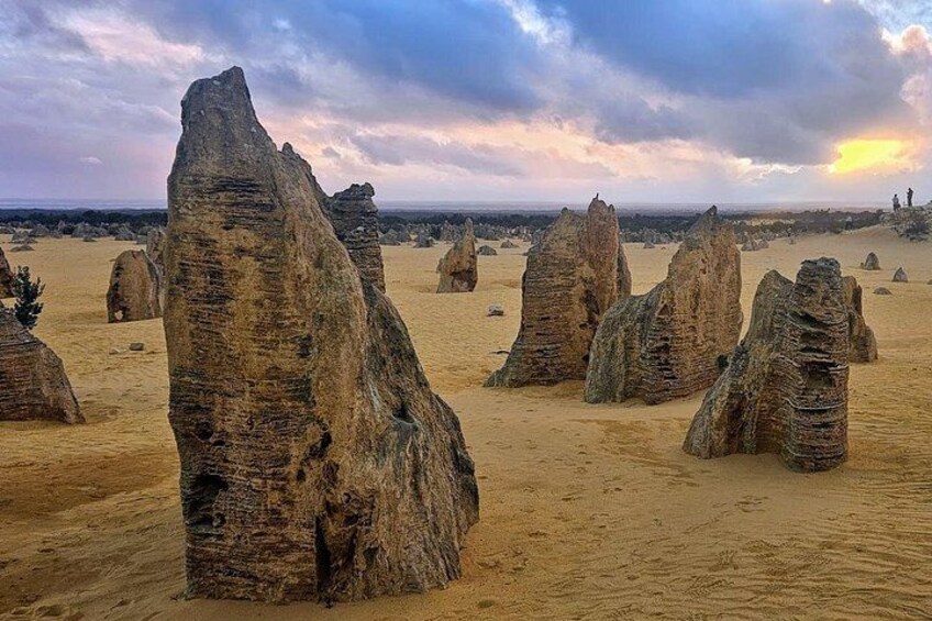 A desert landscape with prominent rock formations. 3