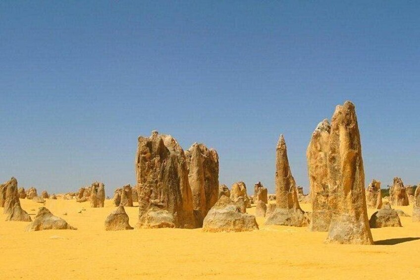A desert landscape with numerous rock formations. 3
