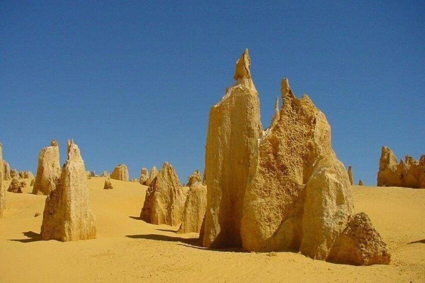 A desert landscape with prominent rock formations. 4