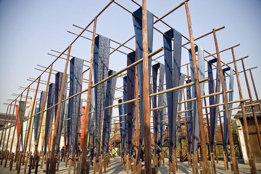 A construction site with scaffolding and vertical structures. 4