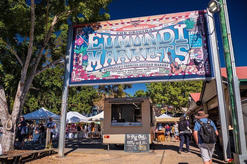 A sign for the Eumundi Markets, a food and craft market. 3