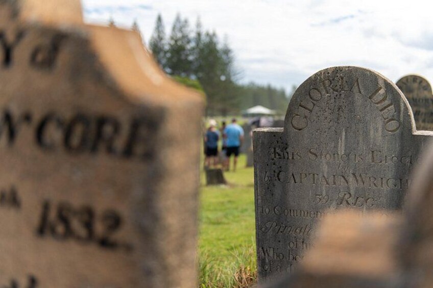 A cemetery with headstones, including one for Captain Wright. 5