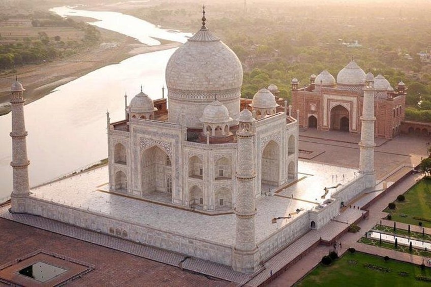 The Taj Mahal with a river in the background. 1