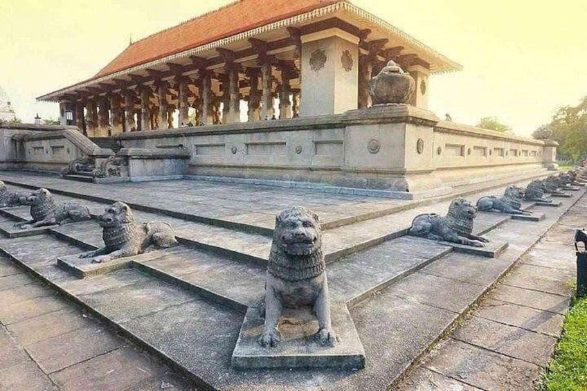 A temple with stone lion statues in front. 3