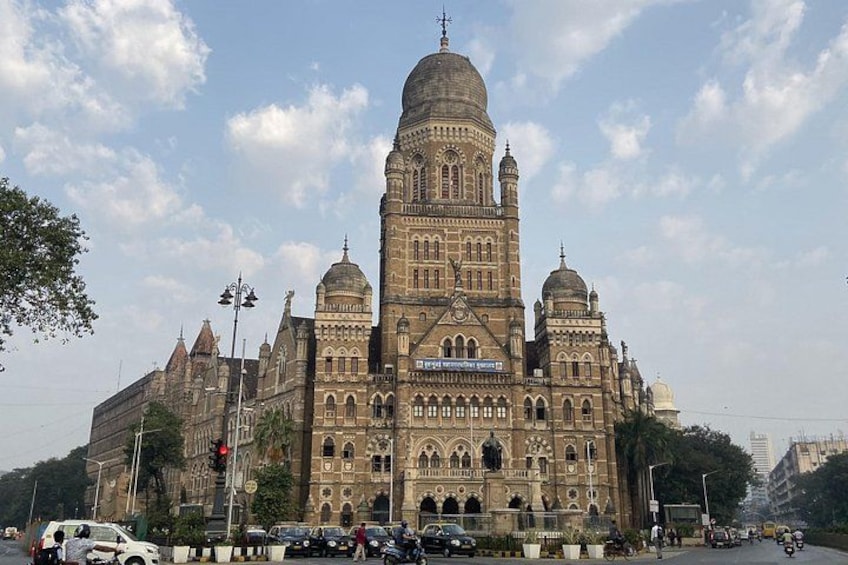 A large, ornate building with multiple domes and intricate architectural details. 1