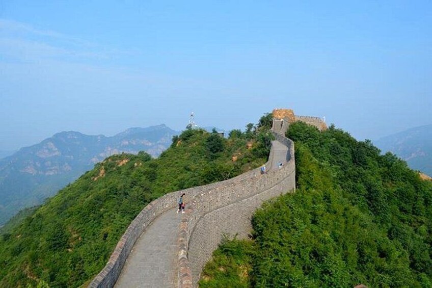 The Great Wall of China winding through a mountainous landscape. 1