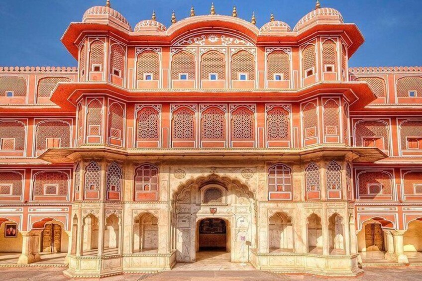 A large, ornate building with intricate architectural details and a prominent entrance. 4