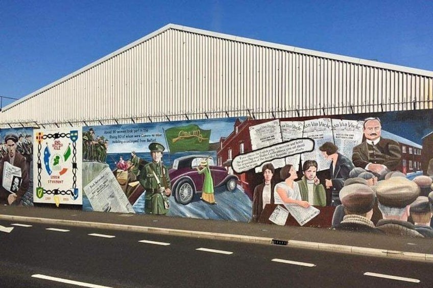 A mural on a building with historical figures and a vintage car. 3
