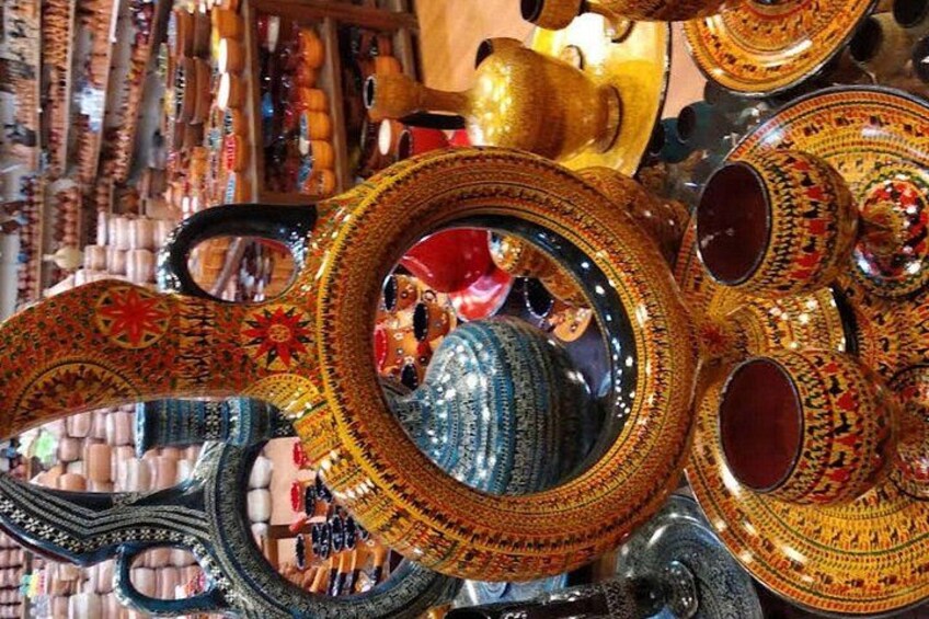 A variety of intricately patterned ceramic pots and bowls. 3