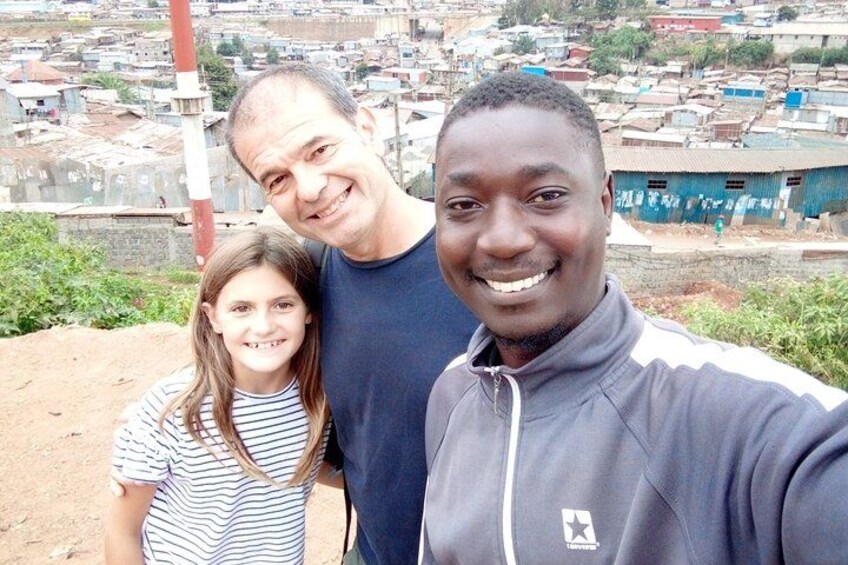 Family visits visitkiberaexpeditions.com 5