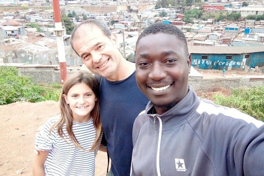 Family visits visitkiberaexpeditions.com 2