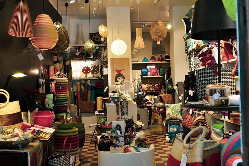 A store interior with various bags and accessories on display. 4