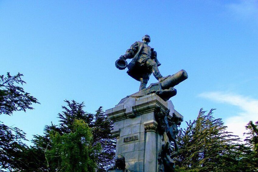 A statue of a man holding a cannon on a pedestal with the inscription 'MONTCLAIR' visible. 2