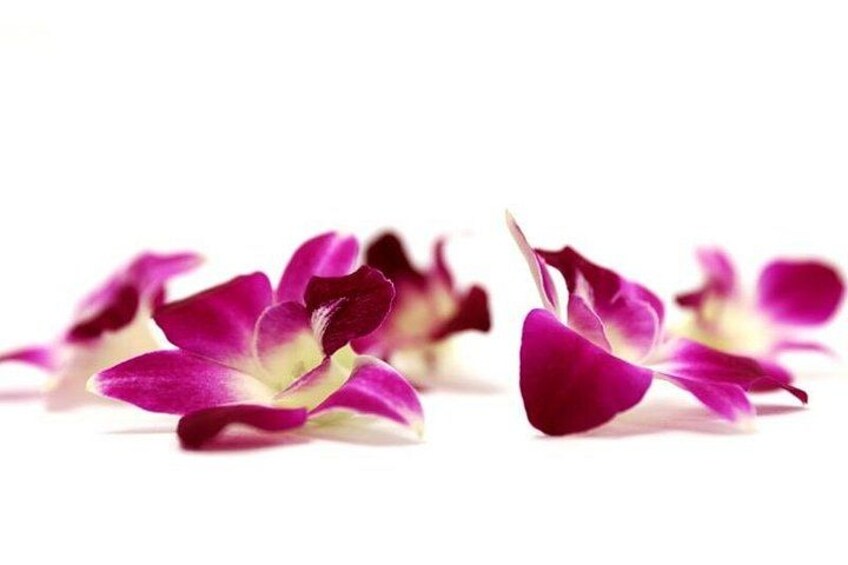 Loose orchids used to make leis 5