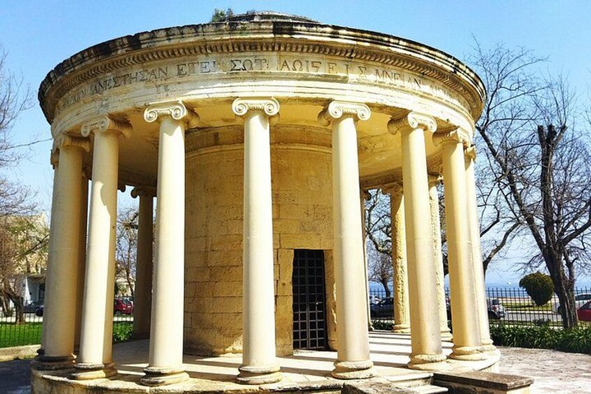 A classical building with columns and inscriptions. 2