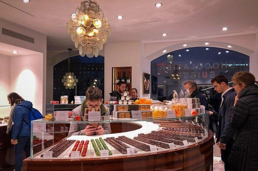 Geneva chocolate tour highlight: artisan boutique showcasing curated chocolate assortments in an elegant tasting space 4