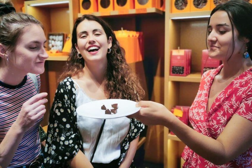 Geneva chocolate tour highlight: guided tasting moment where guests discover artisan flavors through expert-led sampling 5