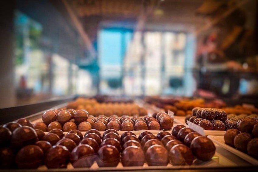A display of assorted chocolates in a store. 4