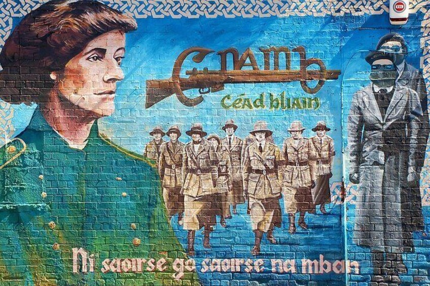A mural with a woman, soldiers, and a man in a suit. 3