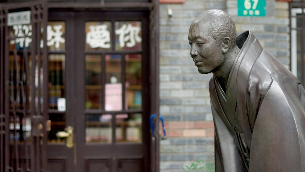 Statue of a man on Duolun Culture Road in Shanghai