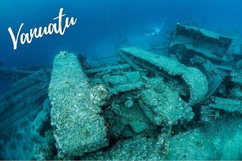 Underwater wreckage with the text 'Vanuatu' visible. 1
